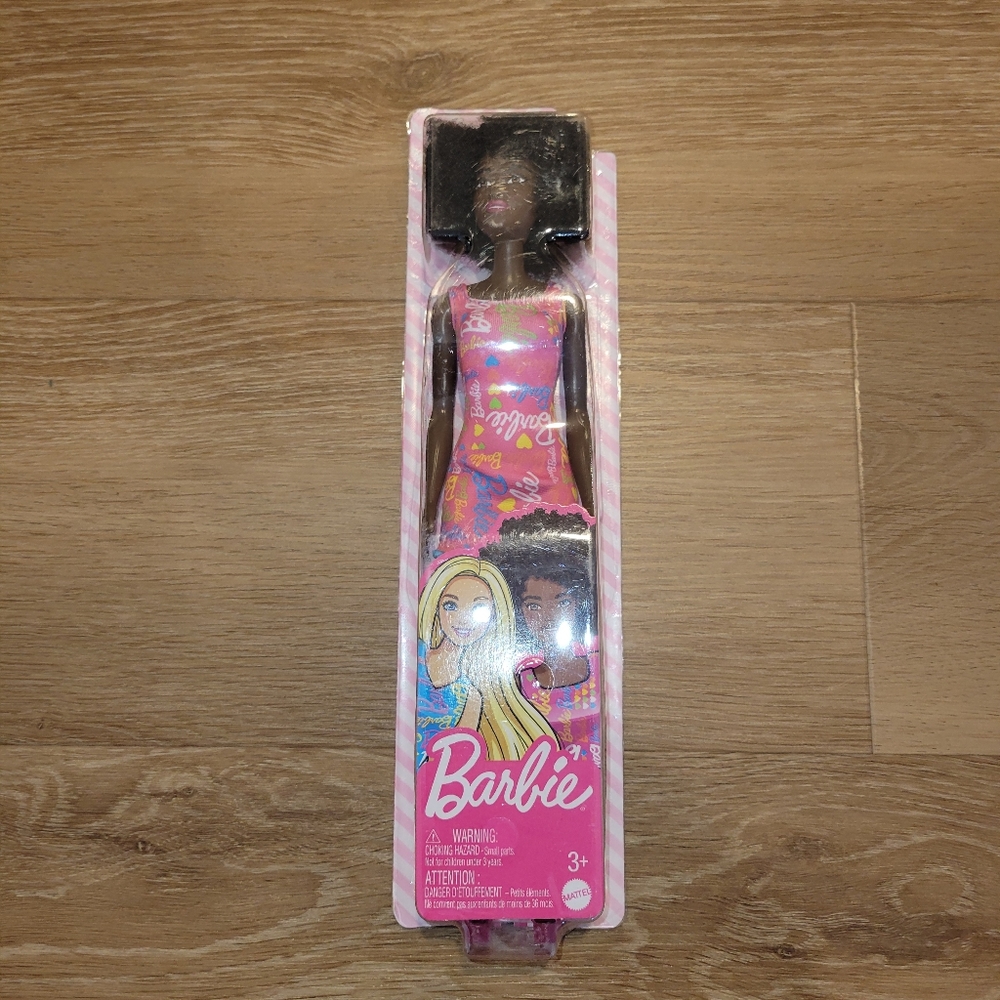 Barbie Doll In Pink Barbie Dress Afro Mattel New. Boxes vary in condition
